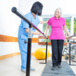 Rehabilitation clinic with elderly people and nurse