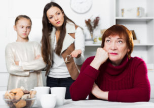 Senior woman having conflict with family