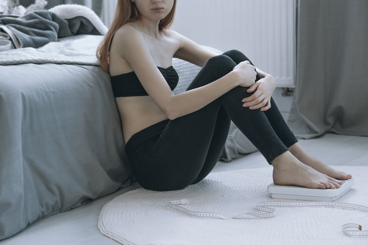 Young sick girl with anorexia