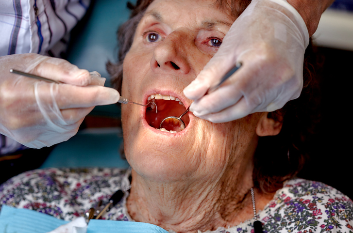 Elderly woman gettng a Dental Check Up