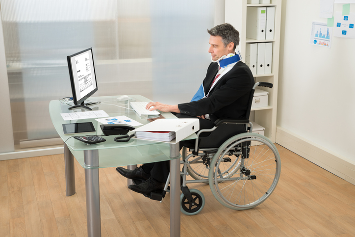 Disabled Businessman Using Computer