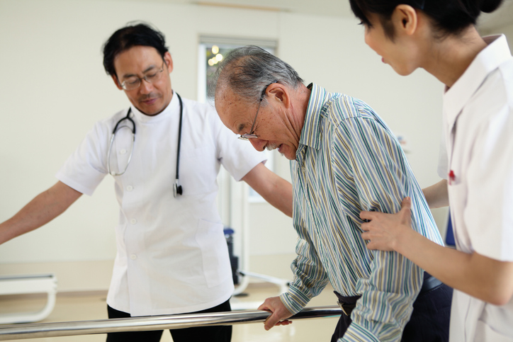 Japanese senior with medical staff
